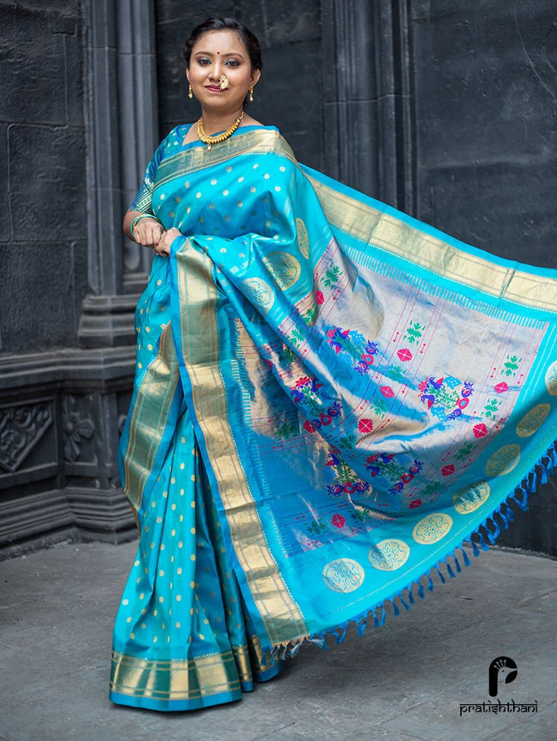 A beautiful sky blue Kalanjali Paithani saree