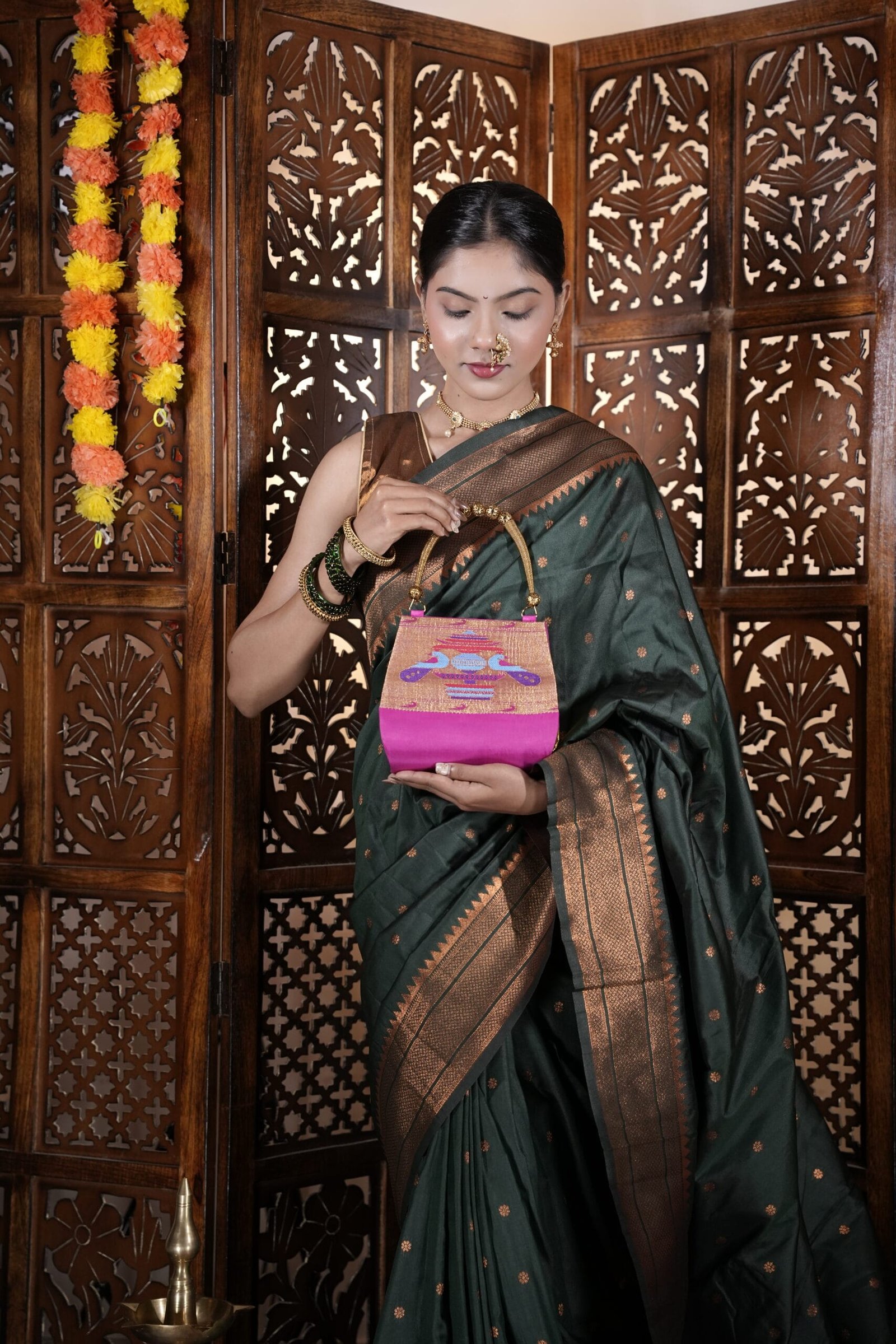 Pink traditional Paithani purse with handcrafted design