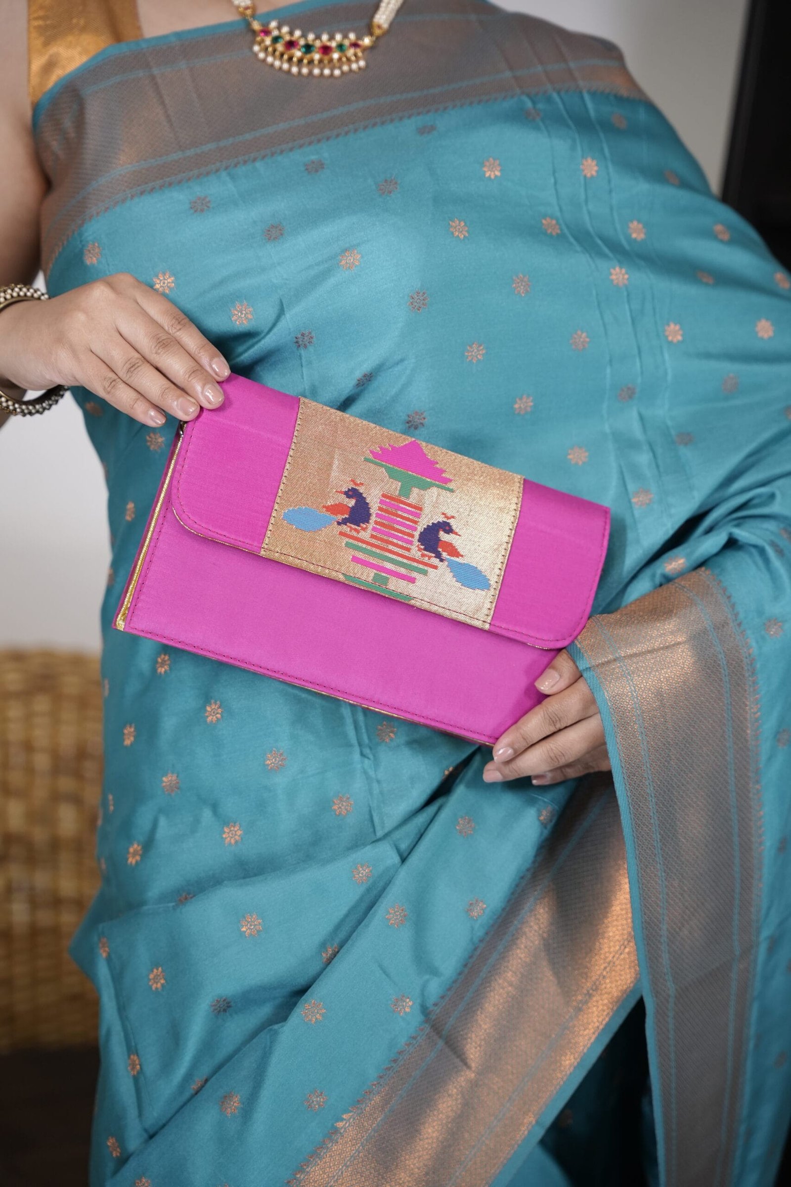 Pink traditional Paithani purse with handcrafted design