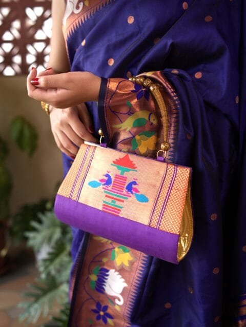 Handmade purple Paithani purse by Pratishthani
