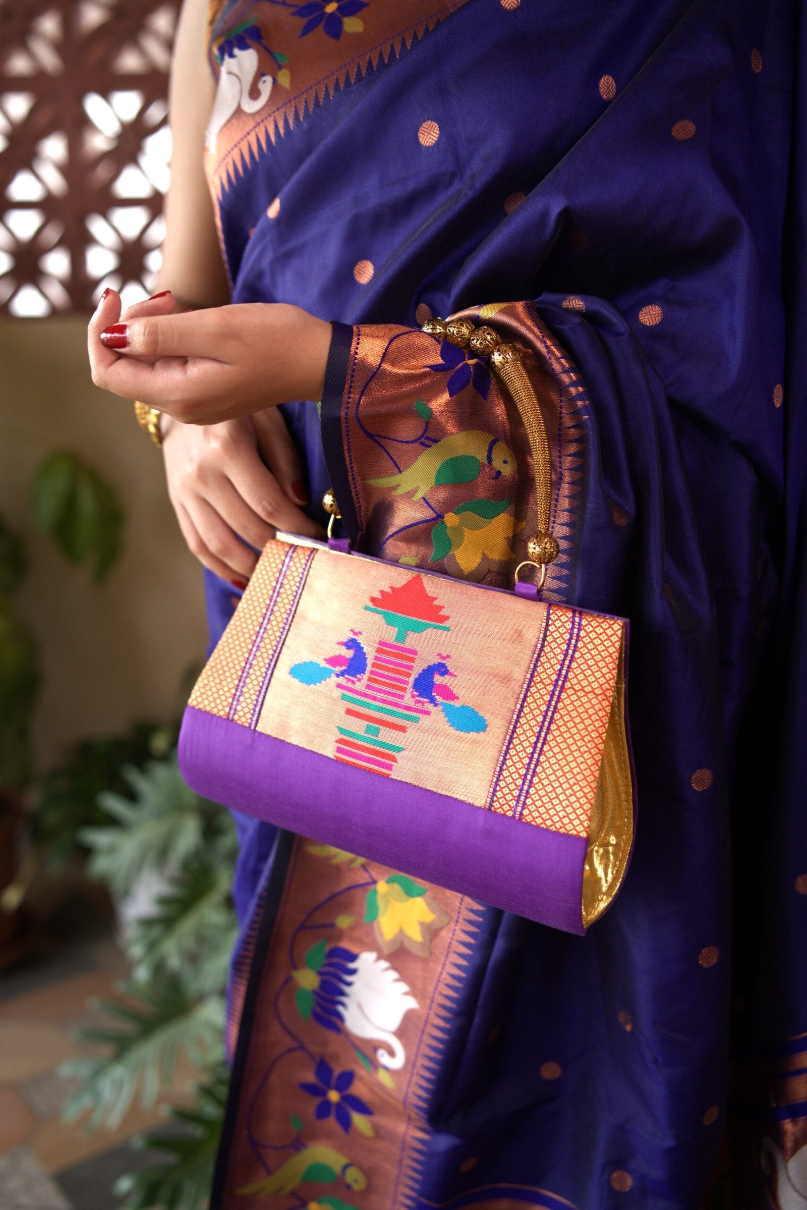 Handmade purple Paithani purse by Pratishthani